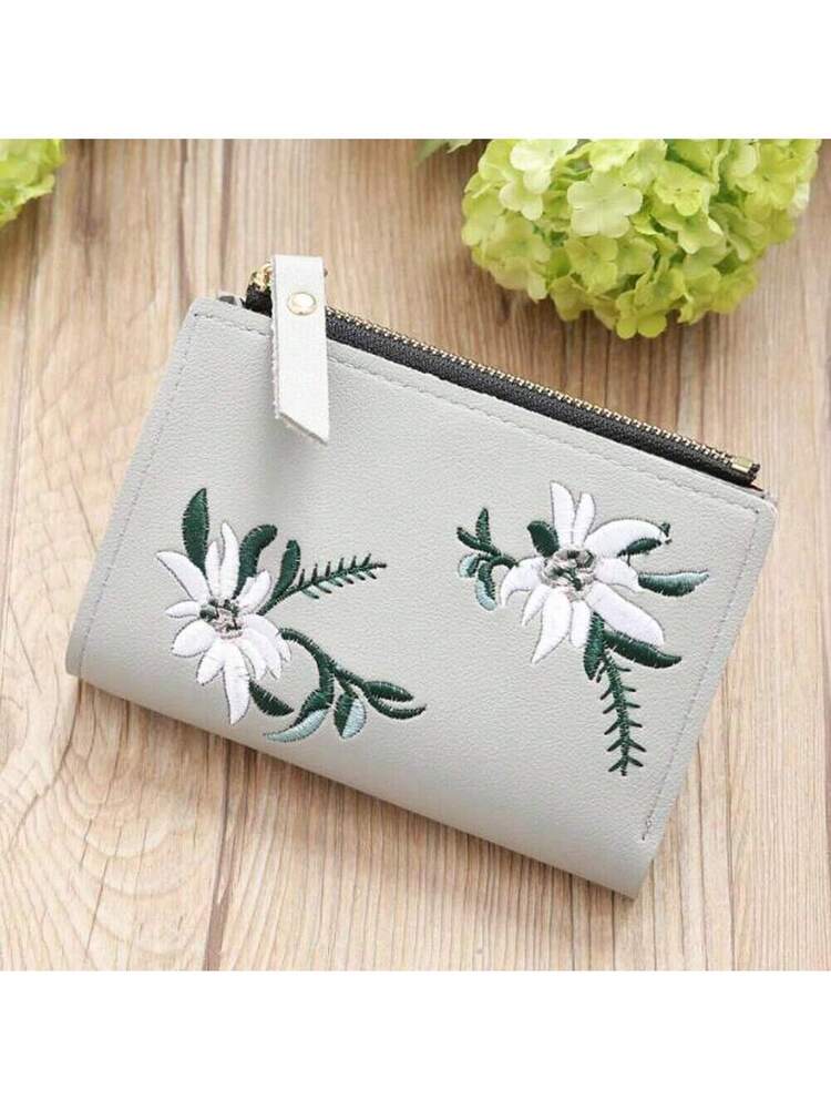 Small Black Bifold Wallet with White Flower Embroidery and Zipper Closure