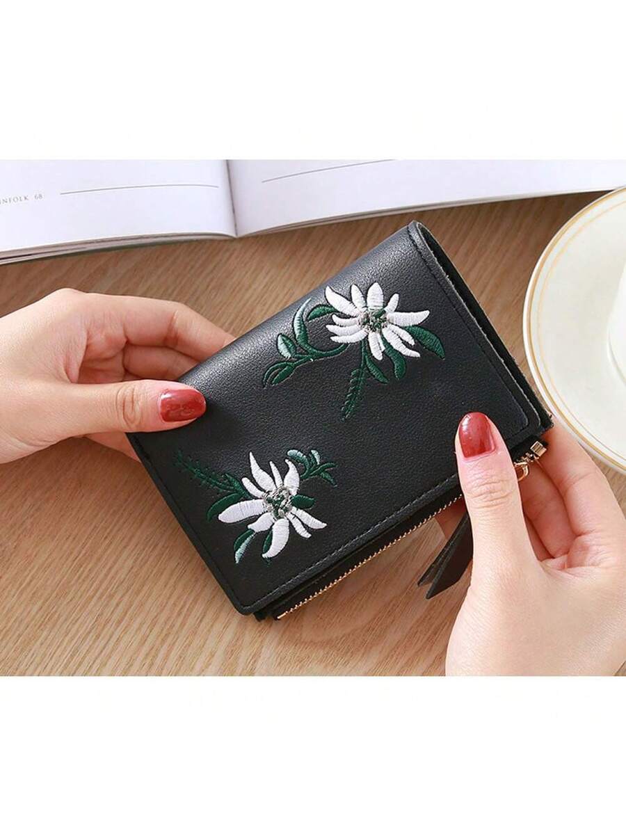 Small Black Bifold Wallet with White Flower Embroidery and Zipper Closure